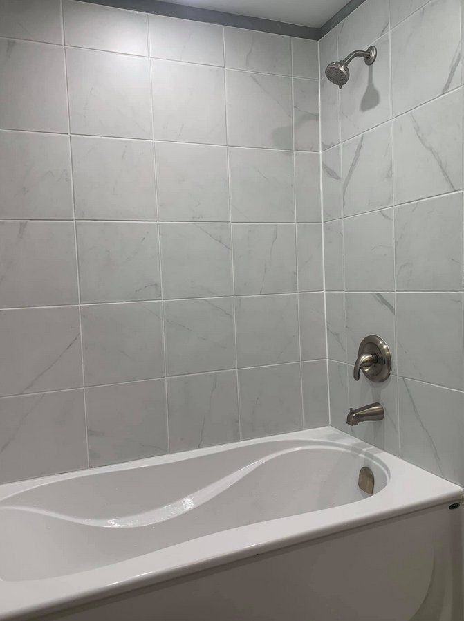 J Thompson Plumbing — tub and shower London